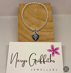 Sterling silver small oval bracelet with personalised heart charm