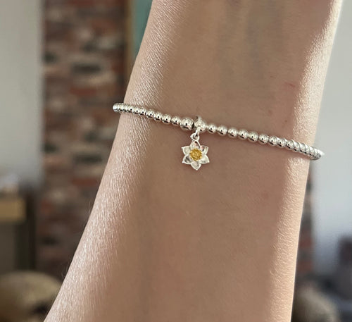 Sterling silver daffodil charm bracelet