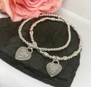 Sterling silver oval cut spacer bracelet with personalised heart charm
