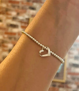 Sterling silver bracelet with 1 ribbon heart