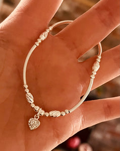 Long spacer with crystal cut oval beads and choice of charm