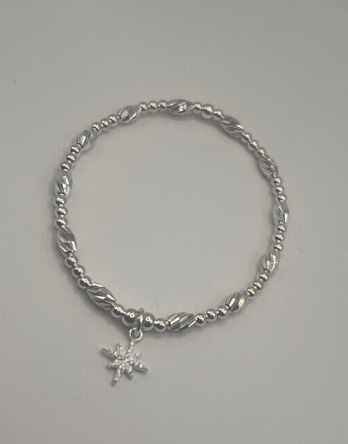 Sterling silver oval cut spacer with North star charm