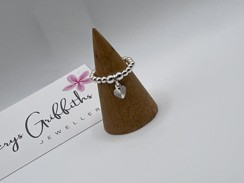 Sterling silver flat starburst heart ring