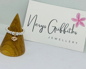 Sterling silver and rose gold vermeil heart ring