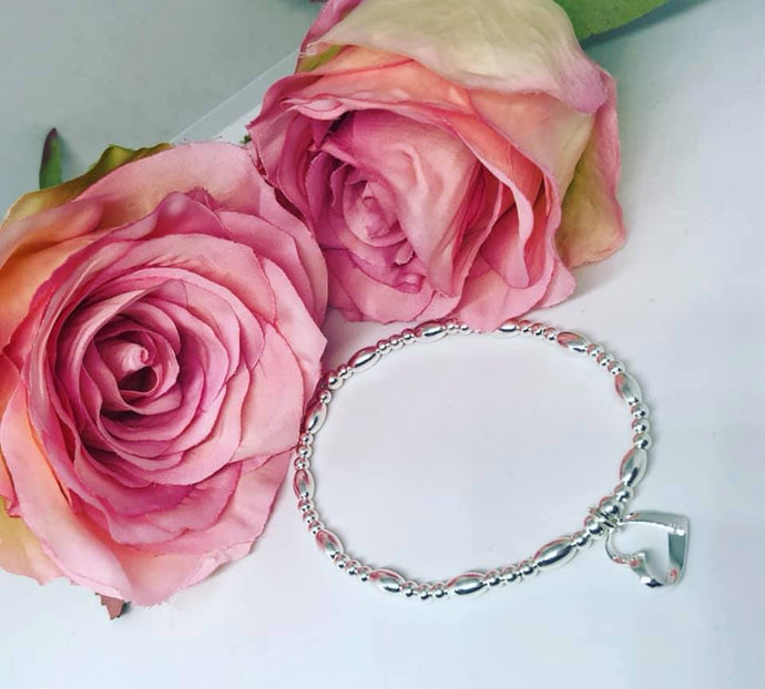 Sterling Silver Oval Spacer Bracelet with Ribbon Heart Charm
