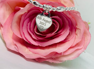 Sterling silver bracelet with personalised heart charm