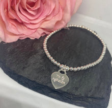 Sterling silver bracelet with personalised heart charm
