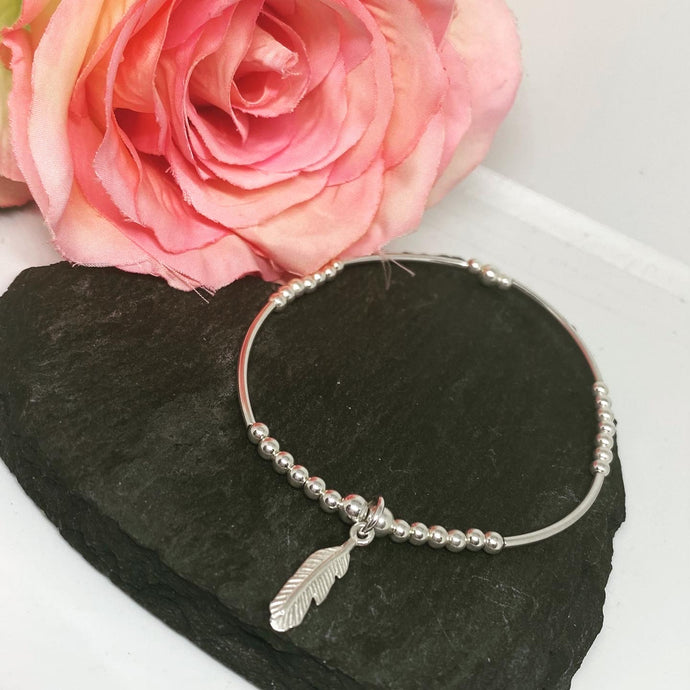 Sterling Silver Spacer Bracelet with Feather Charm