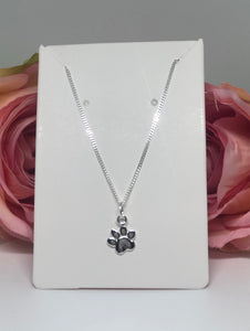 Sterling silver necklace with paw charm