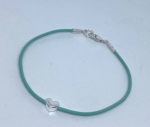 Leather surf bracelet with heart in aqua