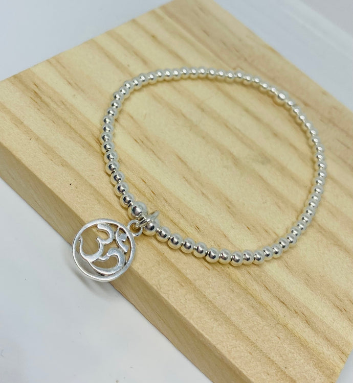 Sterling silver bracelet with Ohm charm