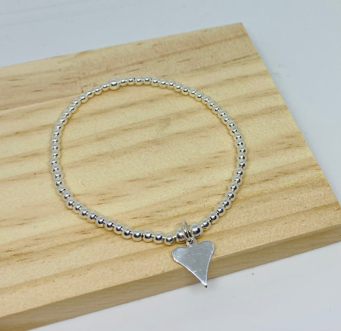 Sterling silver bracelet with Pointy Heart charm