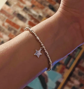 Sterling Silver Oval Spacer Bracelet with Star Charm