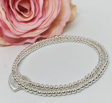Sterling silver double strand bracelet with open heart