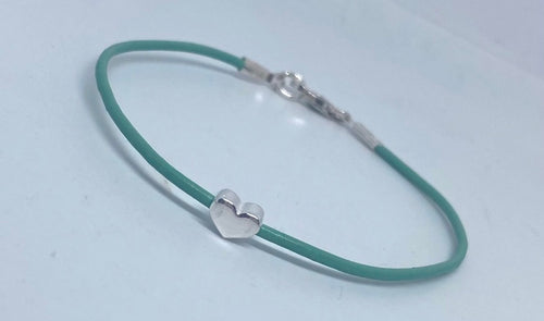 Leather surf bracelet with heart in aqua