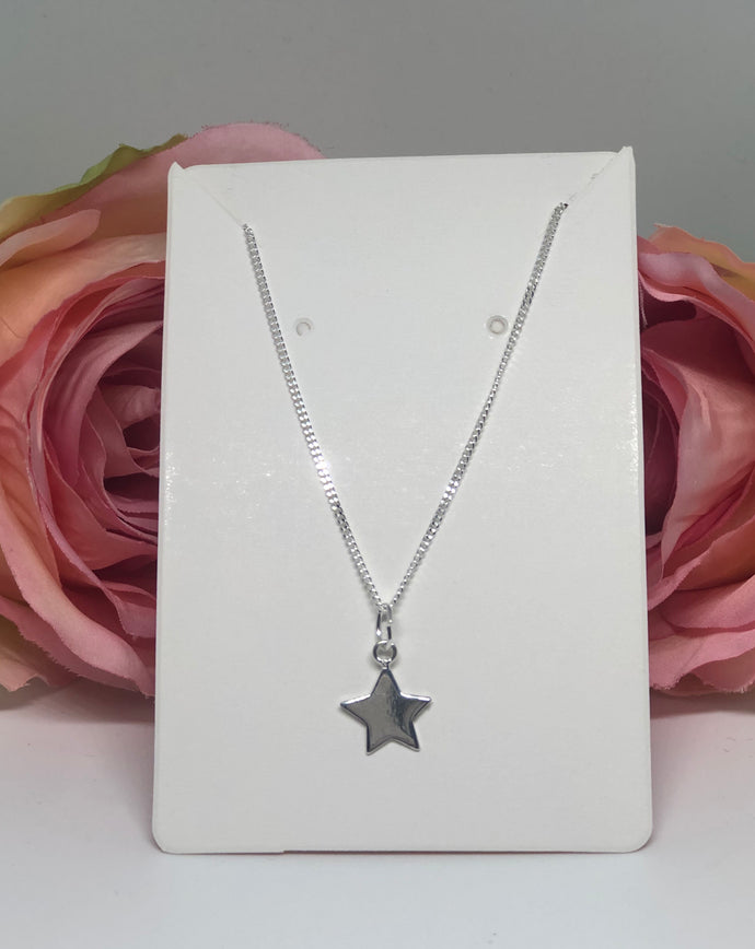 Sterling silver necklace with star charm