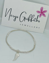 Sterling silver spacer bar bracelet with angel wing