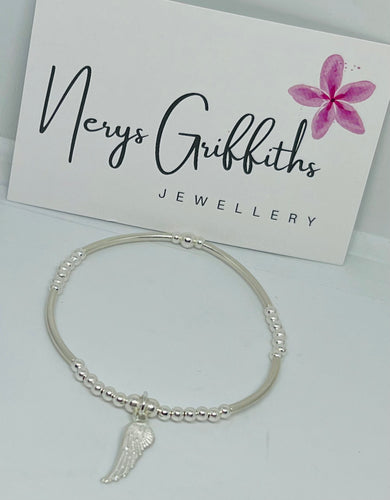 Sterling silver spacer bar bracelet with angel wing