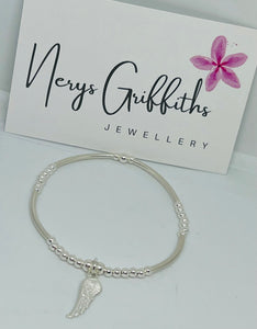 Sterling silver spacer bar bracelet with angel wing
