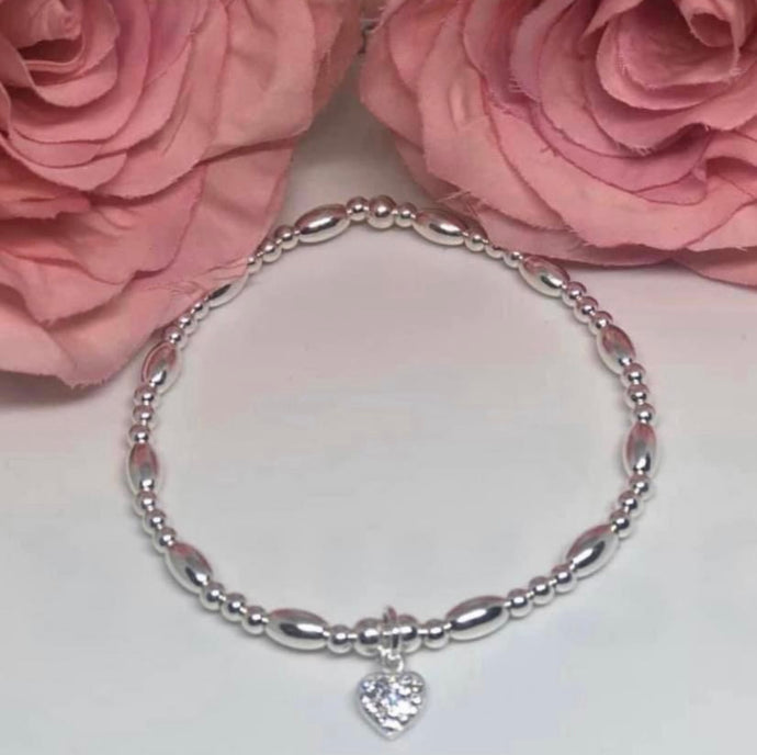 Sterling silver oval spacer crystal heart bracelet