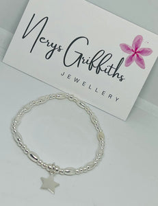 Sterling Silver Oval Spacer Bracelet with Star Charm