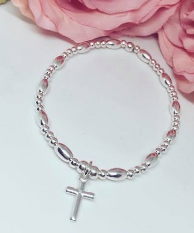 Sterling Silver Oval Spacer Bracelet with Cross Charm